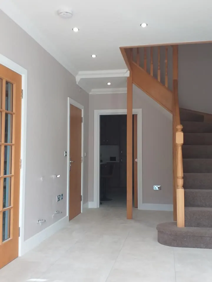 a staircase leading to a living room