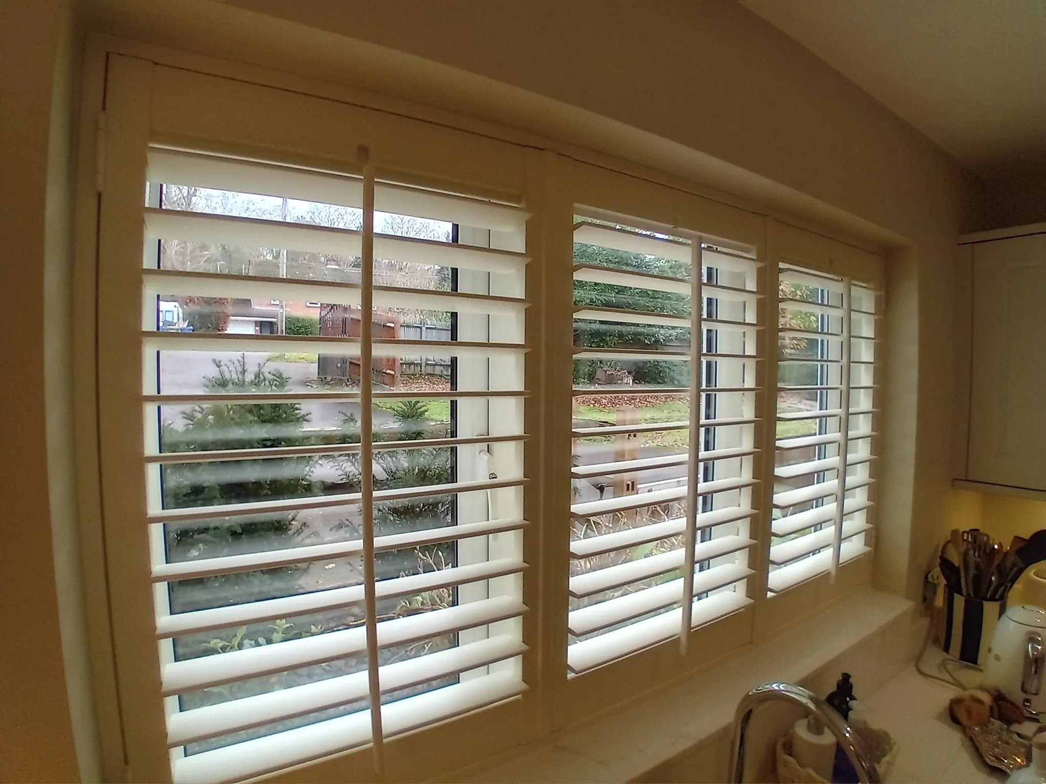 a kitchen with a sink and a window