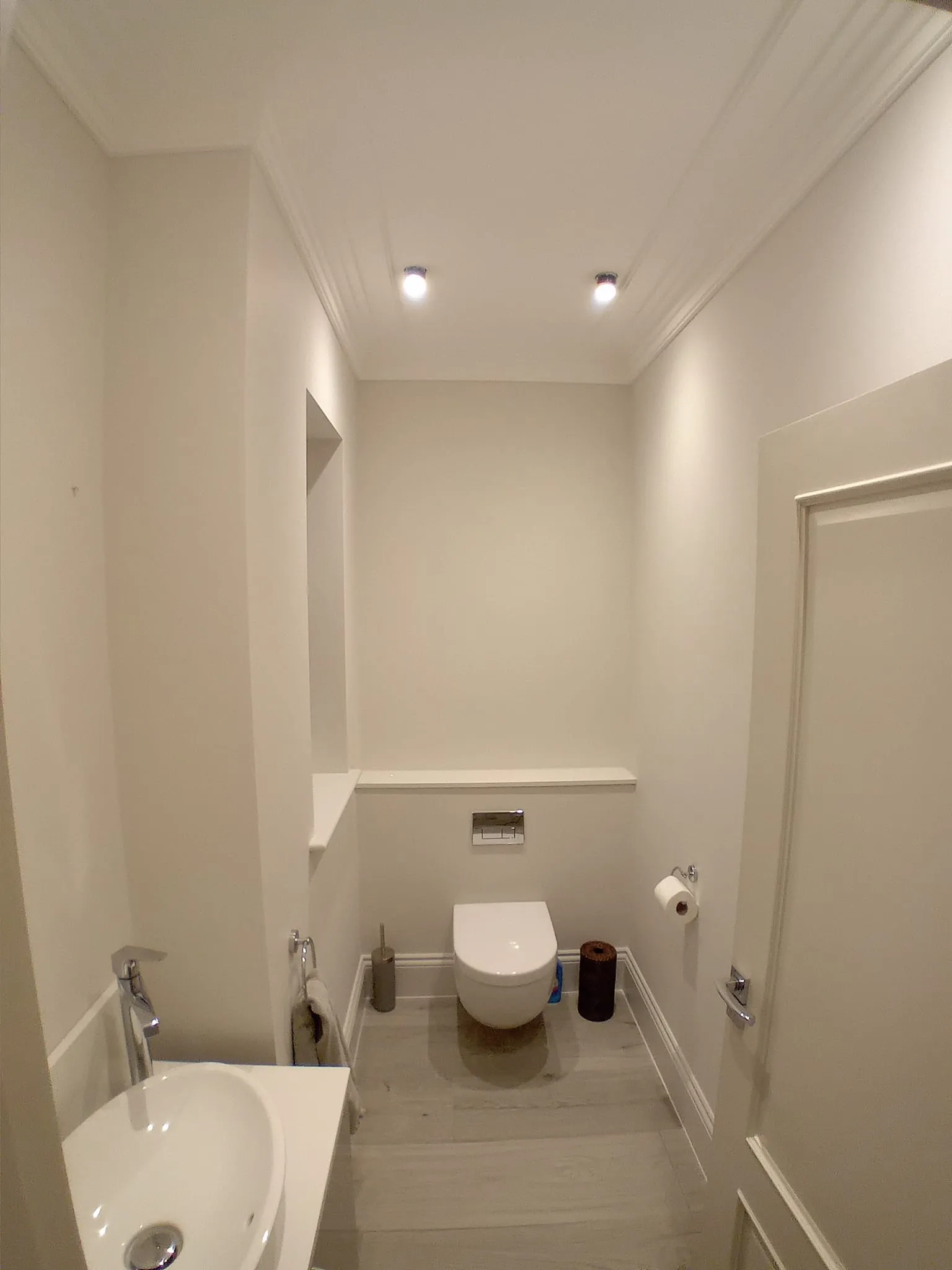 a bathroom with a toilet and a sink