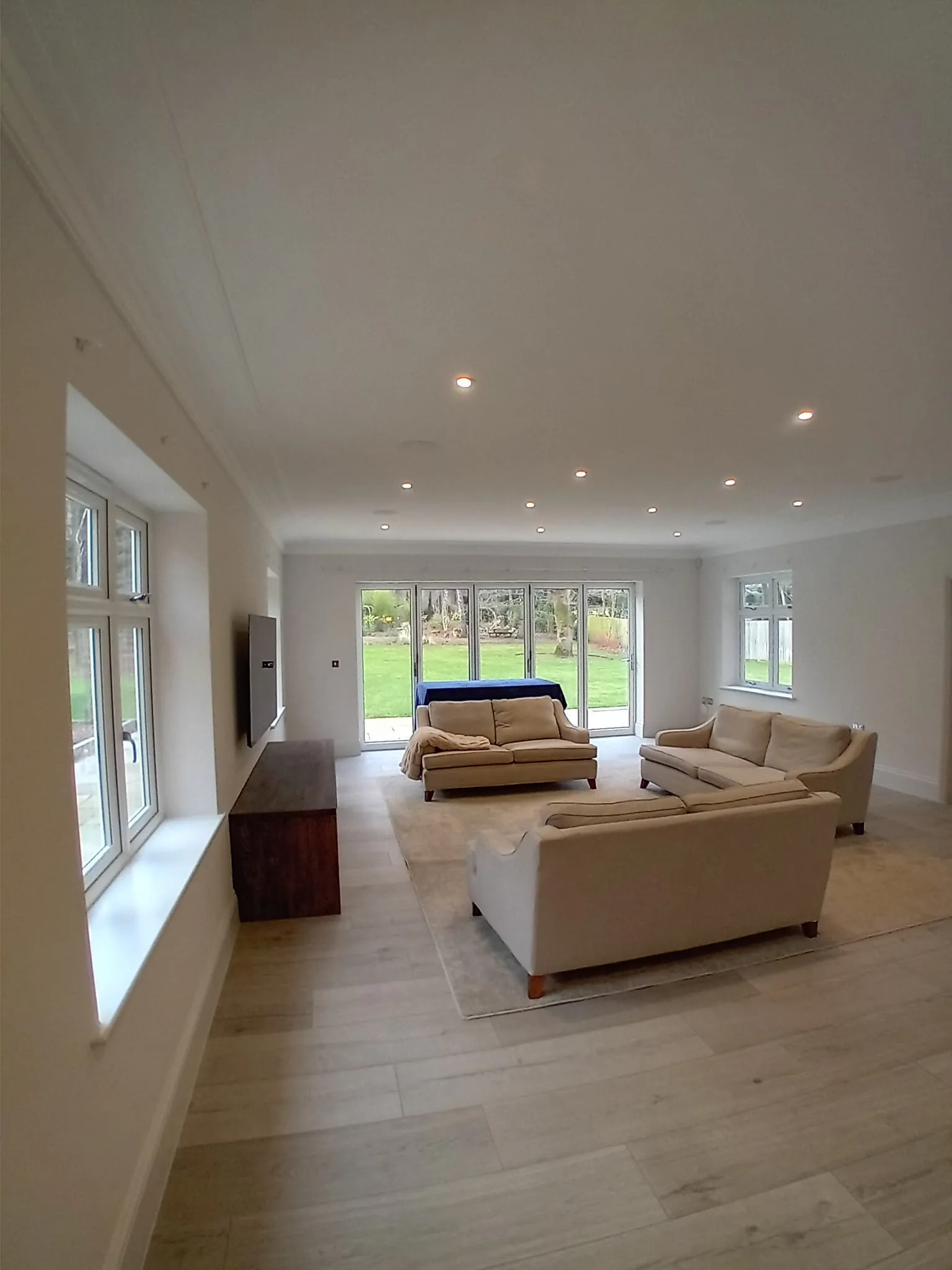 a living room with a couch and a television