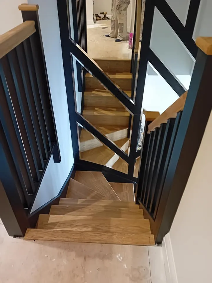 staircase with black balustrades
